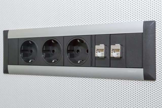 Socket outlet unit in the room-in-room system